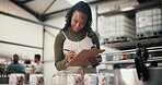 Writing, factory and distillery with woman and clipboard for distribution, manufacturing and alcohol production. Fermentation technician, quality control and inventory management with person