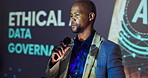 Stage, man and business speaker in conference for ai data governance, ethical guidelines or training workshop. Professional, black person or discussion with mic in international summit for compliance