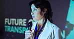 Woman, convention and mic for speech, stage and future of transportation with information for progress. Person, presentation and talk at global conference for development of travel infrastructure