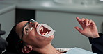 Teeth, cleaning and woman with dentist in office for oral hygiene, healthcare and plaque removal. Dental, service and work with discussion in consult for appointment, procedure and cavity prevention