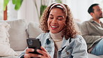 Happy woman, laughing or chatting with phone on sofa for communication, texting or social media at home. Young, female person or interracial couple with mobile smartphone for funny app, humor or joke