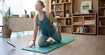 Exercise, stretching and tablet with yoga woman in living room of home for holistic or wellness routine. Awareness, balance and online pilates class with person on floor for exercise or flexibility