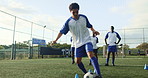 Man, running and ball with cone for soccer of fitness practice, warm up and exercise performance. Athlete, beacon and sports challenge for football balance, agile coaching and game training on field