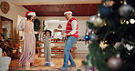 Parents, daughter and excited with dancing on Christmas at home for fun, break and celebration. People, family and happy with kid jumping in living room on festive season for unity, love and support