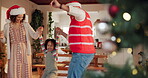 Family, people and excited with dancing on Christmas at home for fun, break and celebration. Parents, girl and happy with kid jumping in living room on festive season for unity, love and support