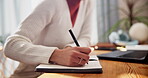 Hands, university student and woman with journal in home for study notes, research and revision. Closeup, desk and female person as college learner with laptop or notebook for exams and education