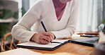 Hands, college student and woman with journal at home for study notes, research and revision. Closeup, desk and female person as university learner with laptop or notebook for exams and education