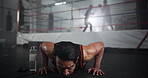 Active, man and push up at gym for fitness, sports workout and boxing competition of resilience. Male athlete, warm up and cardio exercise for health performance, training goals and muscle challenge 