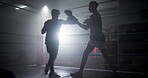 Boxer, personal trainer and men with training for competition in boxing ring with punch workout, agile fighting skills and intense action. Impact sport, fitness and coach with gloves for self defense