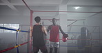 Boxing, training and men in gym with handshake for challenge, competition and coaching for fight. Sports team, boxer and personal trainer in ring for exercise, fitness and shaking hands at mma club