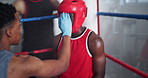 Sports, boxing and man with coach in slow motion for challenge, competition and tournament in ring corner. Personal trainer, fitness and person with boxer help with performance, training and practice