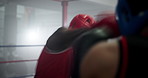 Boxing ring, punch and men in gym with fight, action and champion athlete training for competition together. Gloves, sparring and boxer with fitness coach, exercise or workout challenge at fight club