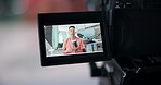 Camera screen, live streaming and presenter with man in broadcast office for info, news or reporting. Display, recording and video with person at desk for announcement or coverage on television