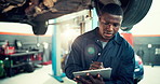 Mechanic, clipboard and checklist with black man and car in auto repair shop for diagnostic system, transport or calibration. Engineering, maintenance or motor technician with person in garage