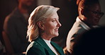 Mature business woman, audience and convention with listening, career and smile at international seminar. Person, crowd and happy for training, information and opportunity for growth at conference