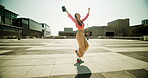 Girl, phone and dance outdoor for celebration, achievement and university application with excited face. Woman, mobile and headphones in city for good news, success and college scholarship with music