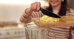 Hands, woman and fruit in blender in home for breakfast drink, healthy diet and pineapples smoothie. Person, knife and cutting board in kitchen to prepare ingredients for meal prep or nutrition shake