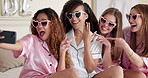 Selfie, wedding and bride with women in sunglasses at hotel room for getting ready together for ceremony. Happy, engagement ring and female person with bridesmaids for photography picture in lodge.