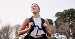 Forest, woman and thinking on hiking for fitness as adventure, exercise and workout in Canada. Female person, backpack and smile or happy in woods for walking, explore and trekking for health