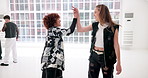 High five, hip hop and music with people in studio for choreography or rehearsal success together. Art, creative and dance with woman friends in class for support at learning or lesson for practice