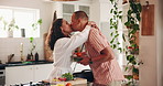 Kiss, couple and ready in kitchen with lunchbox, food and prepare for work in home. Love, bonding and romance with man, woman and breakfast or healthy meal with morning routine or support in house