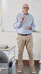 Presentation, education and whiteboard as teacher in writing in classroom for growth or development. Male person, study methods and assessment for high school module with knowledge, students and exam