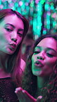 Women, friends and kisses at night club on selfie for social media, post and profile picture. People, happy and confident with music at event or disco for fun, entertainment or new year celebration