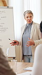 Office, businesswoman and presentation with whiteboard for mentoring, sales strategy and discussion. Workplace, mature person and speaker with information for corporate project, solution and workshop