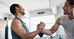 Men, fitness and exercise in gym for handshake, stopwatch and break with challenge, cardio and workout. People, training and support in sports club for fatigue, recovery and health with smart watch