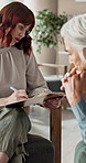 Senior woman, consultation and anxiety with therapy for grief, flashback or trauma counseling. Mental health, support and therapist with clipboard in office for ptsd guidance, advice or patient notes