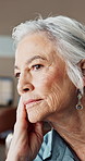 Thinking, house and sad with senior woman, depression and mental health with memory. Apartment, pensioner and elderly person with nostalgia, remember and contemplation with retirement and thoughtful