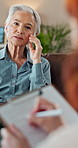 Senior woman, talking and psychologist in office for mental health, assessment and evaluation process. Elderly patient, therapist and discussion in practice for problem solving to manage depression