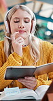 Thinking, student and headphones for writing in notebook of studying solution, schedule planner and education. Girl, listening and lecture podcast with learning notes, assignment information and exam