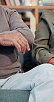 Senior, hands and angry couple with conflict for financial crisis, disagreement and unhappy on sofa. Frustrated, old people and fighting in retirement for toxic marriage, debt problem and addiction