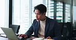 Laptop, thinking and proposal with businessman in office for administration, report or research. Japanese accountant, notebook and problem solving with employee for financial goals management online