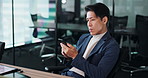 Business, typing and Japanese man with smartphone, internet and connection in modern office. Person, employee and consultant with cellphone, social media and online reading for news, chatting and app