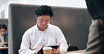 Japanese, business and man with tablet in office for finance report, planning budget and investment. People, reading and  digital with legal paperwork, financial schedule and review feedback in Japan