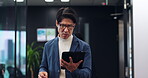Japanese, business and man with tablet in office as lawyer for communication, research and prepare of court case. Male attorney and briefcase with digital, information report an legal advice in Japan