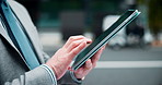 Hands, outdoor and man with tablet, business and typing with digital app, stock market and trading. Closeup, economy analyst or employee in city, tech and website info with investment, email or Japan