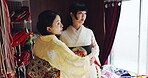 Women, tailor and customer with kimono dress for fitting and traditional event in Japan. Seamstress, client and fashion designer with fabric or clothes at workshop with creativity, textiles and style