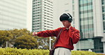 Asian man, student or dancing with headphones in city for music, listening or radio podcast. Young, male person or dancer with headset or bag at park for kpop, sound or beat in an urban town of Japan