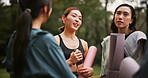 Discussion, fitness and group with woman friends outdoors in park together for start of exercise routine. Conversation, huddle and smile with Japanese people in nature for training or workout