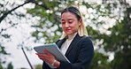 Japanese, business and woman with tablet outdoor of communication, corporate news and city location. Lawyer, feedback and digital for research, court case and schedule update of trial report in Japan