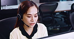 Asian woman, consultant or agency with headphones at call center for customer service or telemarketing at office. Japanese, female person or agent with headset for telecommunications or online advice