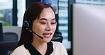 Asian woman, call center and consultant with headphones for telemarketing or customer service at office. Japanese, female person and agent with smile for telecommunications agency or online advice