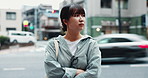 City, thinking and Japanese woman travel, morning commute or journey outdoor with motion blur. Urban street, reflection or serious girl with arms crossed, confidence or tourist on vacation in Tokyo