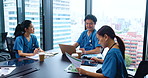 Doctor, team and meeting with documents in office for healthcare planning and medical development. Hospital, Japanese people and paperwork for test results review, health report and surgery analysis