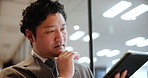 Japanese man, tablet and thinking in office for business, stock market research and investment offer. Mature accountant, tech and reading in Japan agency for planning, agenda and online banking app