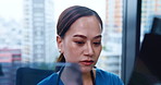Japanese doctor, xray and scan for analysis, research or professional opinion in medical services. Female person, healthcare and MRI as results for wellness, diagnosis and radiology as hospital staff