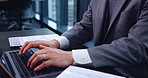 Japanese businessman, laptop and typing in office with documents, report and research in corporate. Male person, technology and working for paperwork as accountant, management and finance company